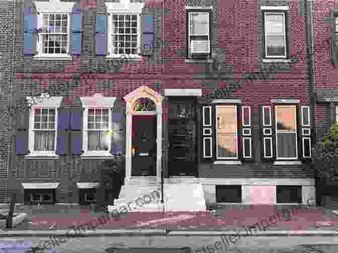 Black And White Photograph Of A Man Walking Past A Row Of Houses In Philadelphia Philadelphia Light: Volume One Selected Photographs 1973 1978